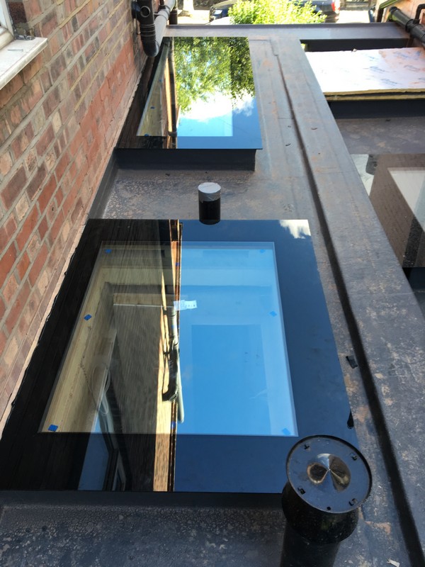 Multiple flat roof skylights on extension in Palmers Green